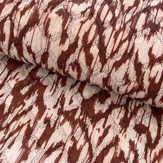 Prešita tkanina Blurry Ikat brown