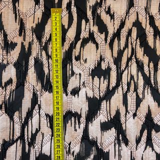 Prešita tkanina Blurry Ikat black